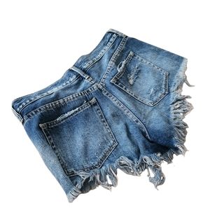 Free People Distressed button fly jean shorts sz. 25
